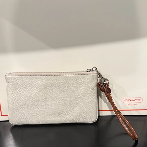 Coach Soho White Leather Wristlet with Brown Buckle Accent - Picture 2 of 9